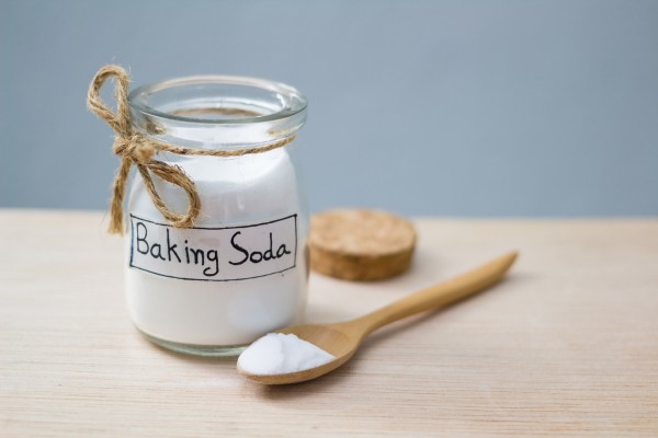 Jar of baking soda with spoon